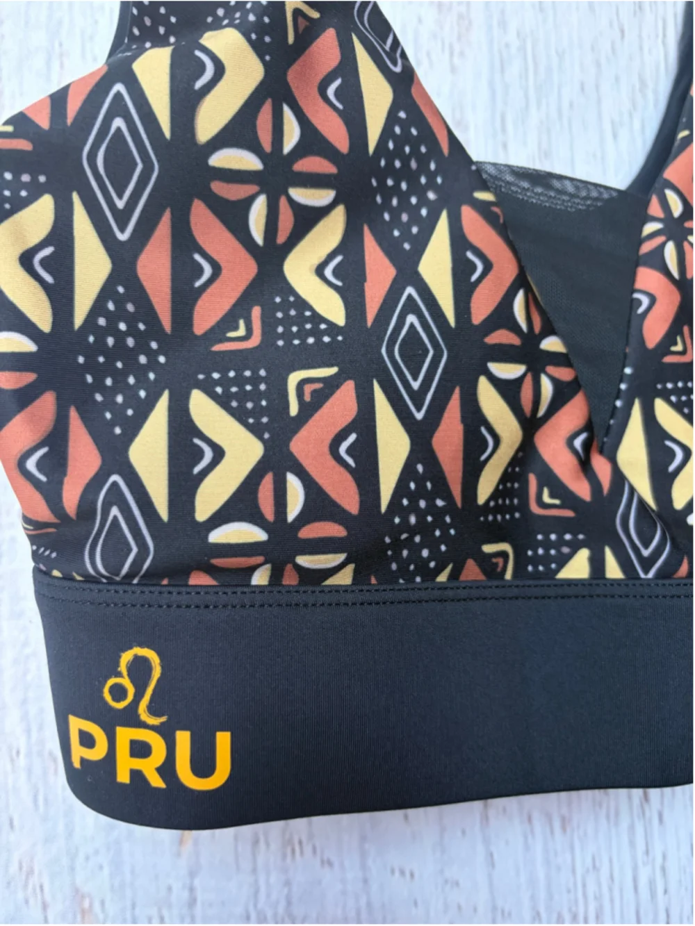 Women's Pru Apparel Sports Bra Size S Black Orange Geometric Print